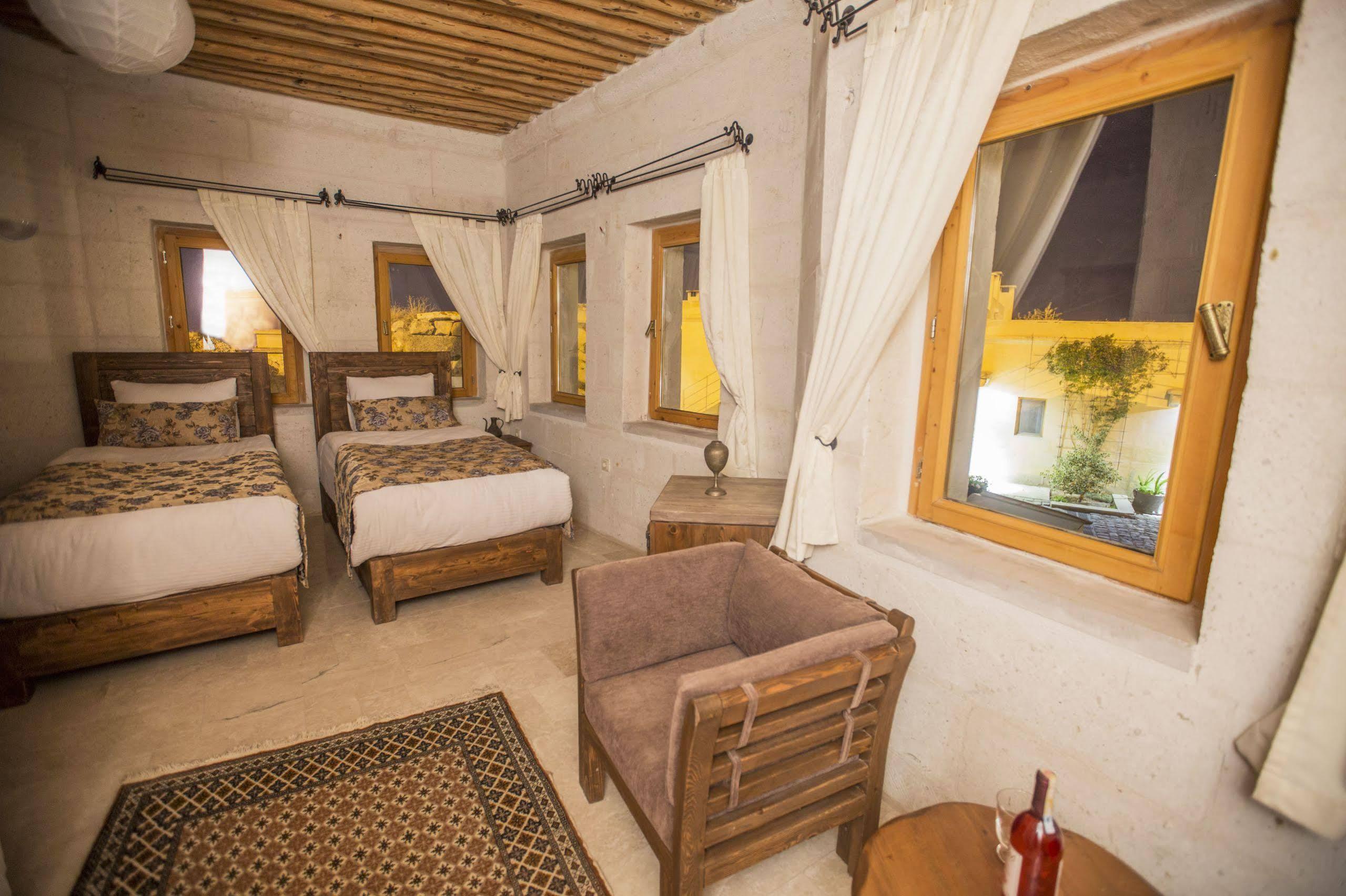 Helike Cave Suites Учисар Экстерьер фото