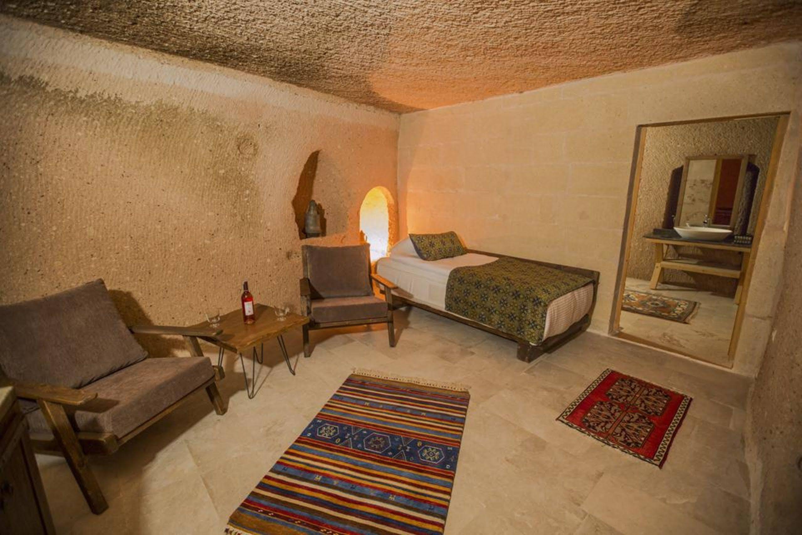 Helike Cave Suites Учисар Экстерьер фото