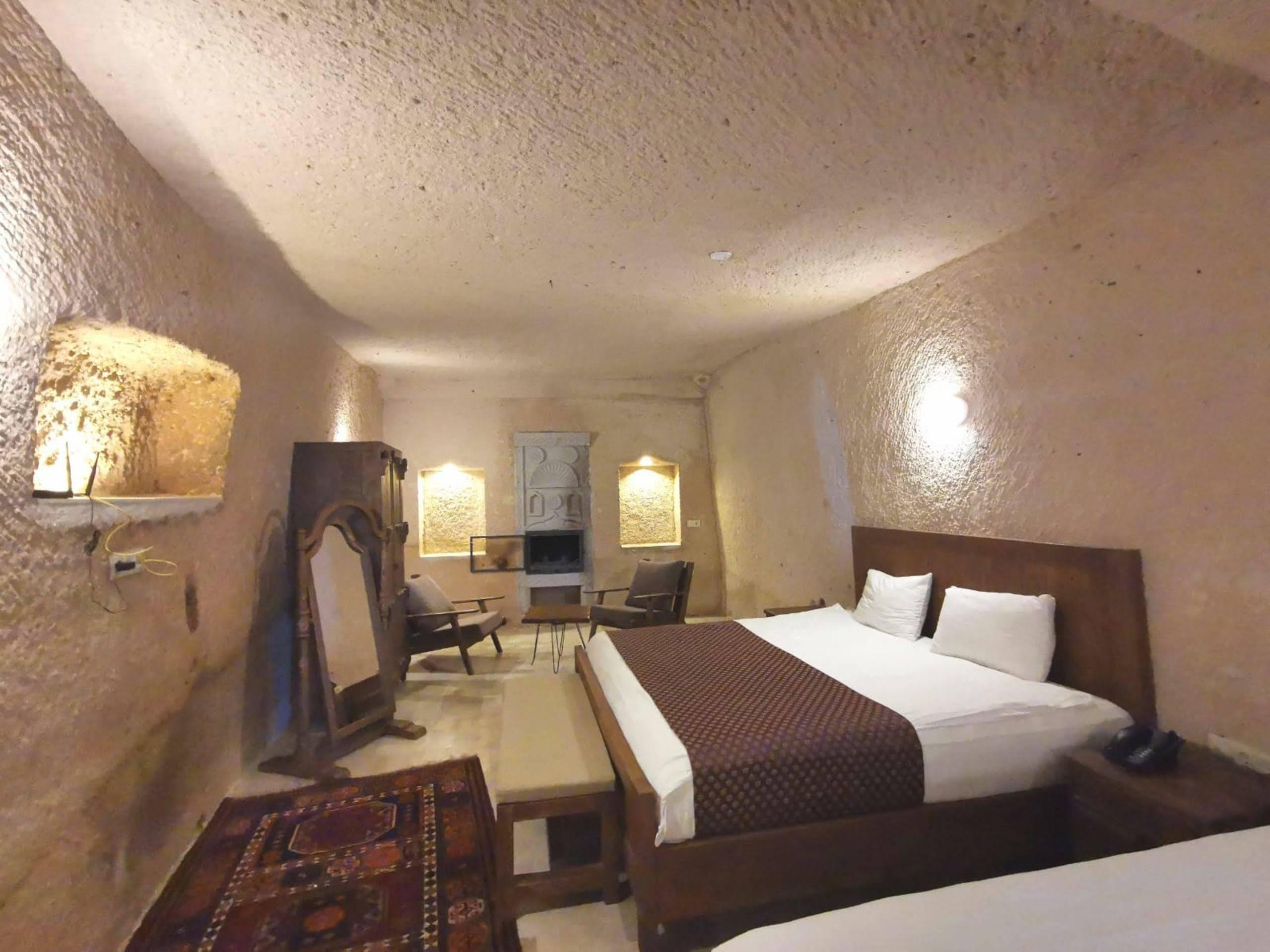 Helike Cave Suites Учисар Экстерьер фото