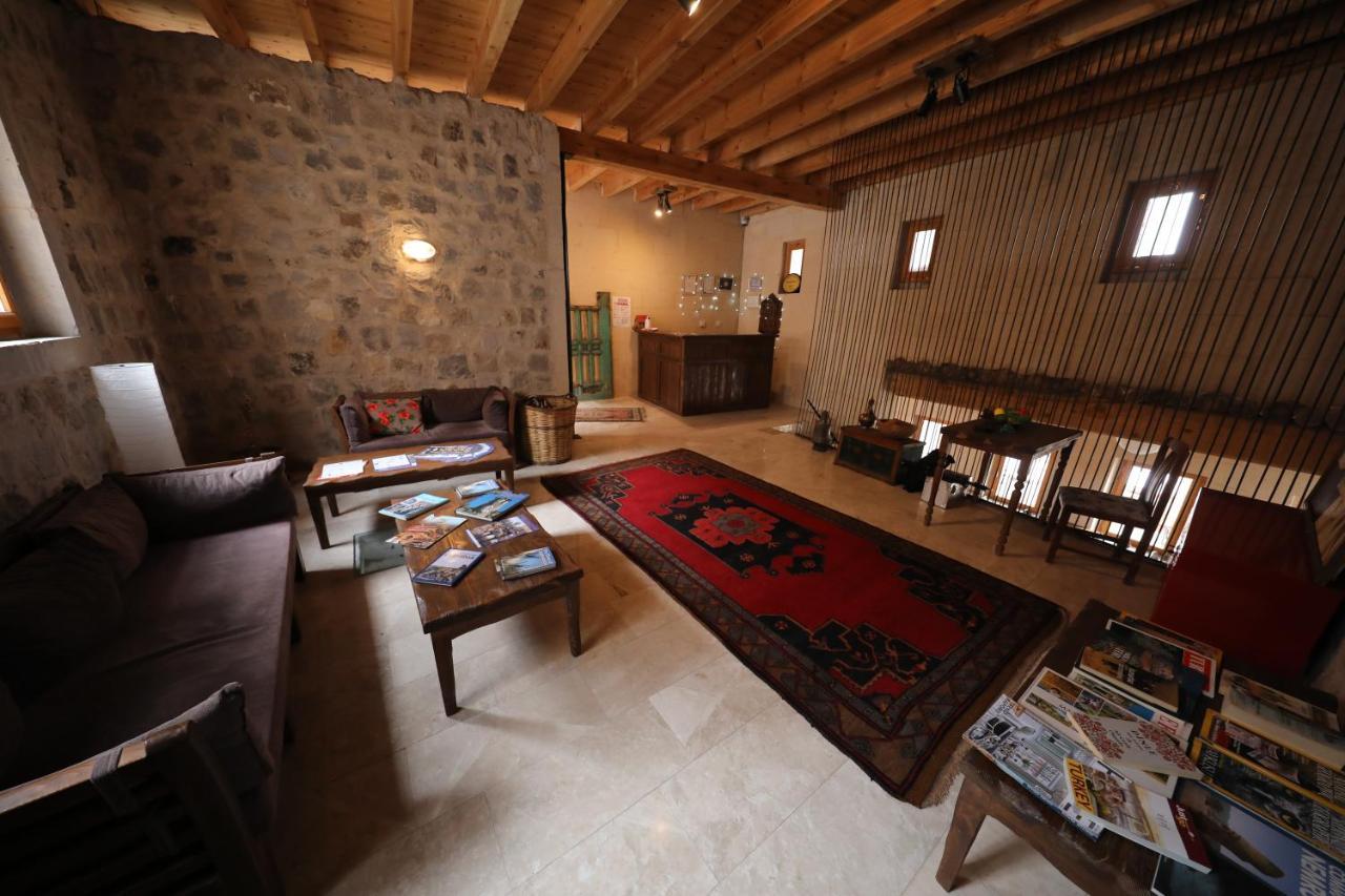Helike Cave Suites Учисар Экстерьер фото