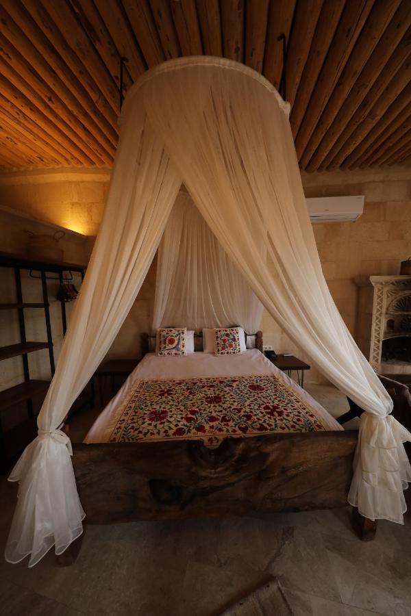 Helike Cave Suites Учисар Экстерьер фото