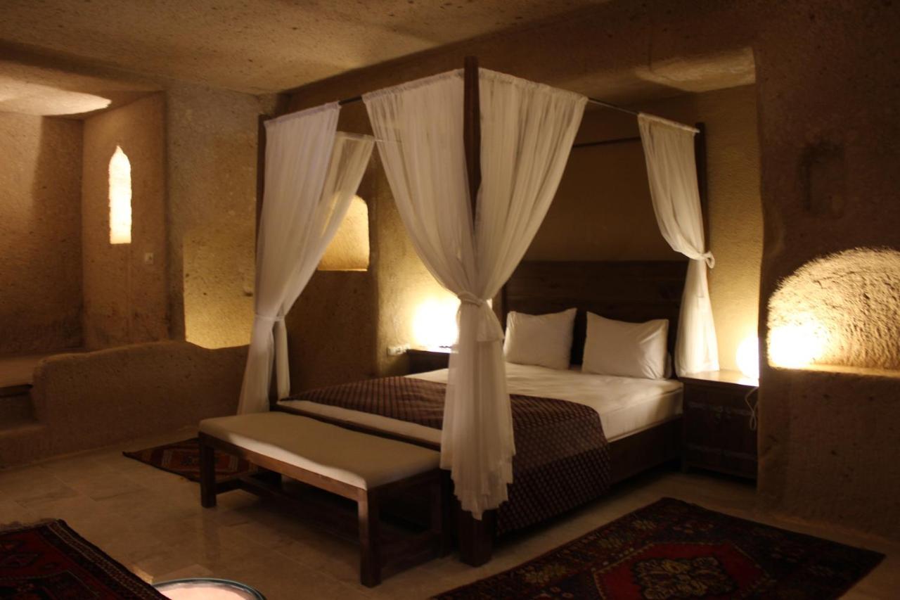 Helike Cave Suites Учисар Экстерьер фото