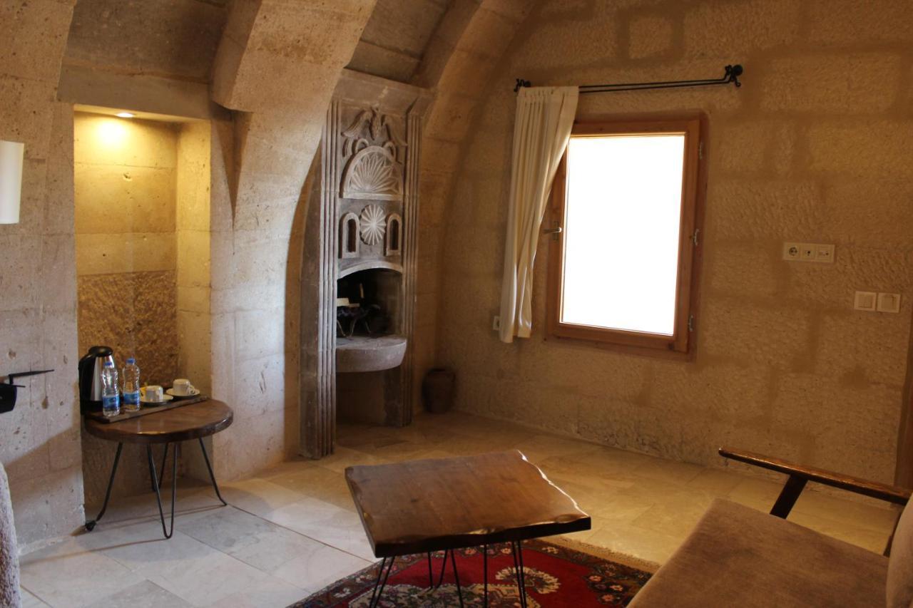 Helike Cave Suites Учисар Экстерьер фото