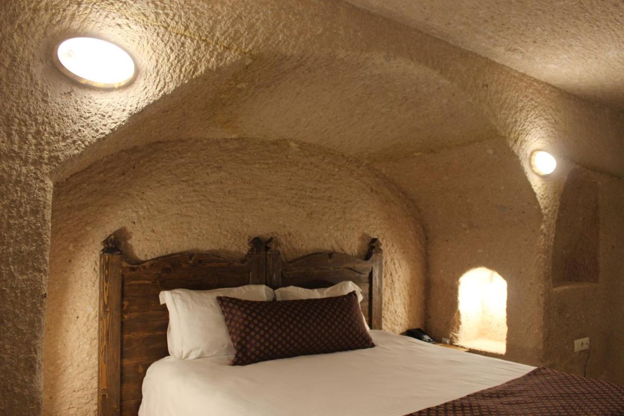 Helike Cave Suites Учисар Экстерьер фото