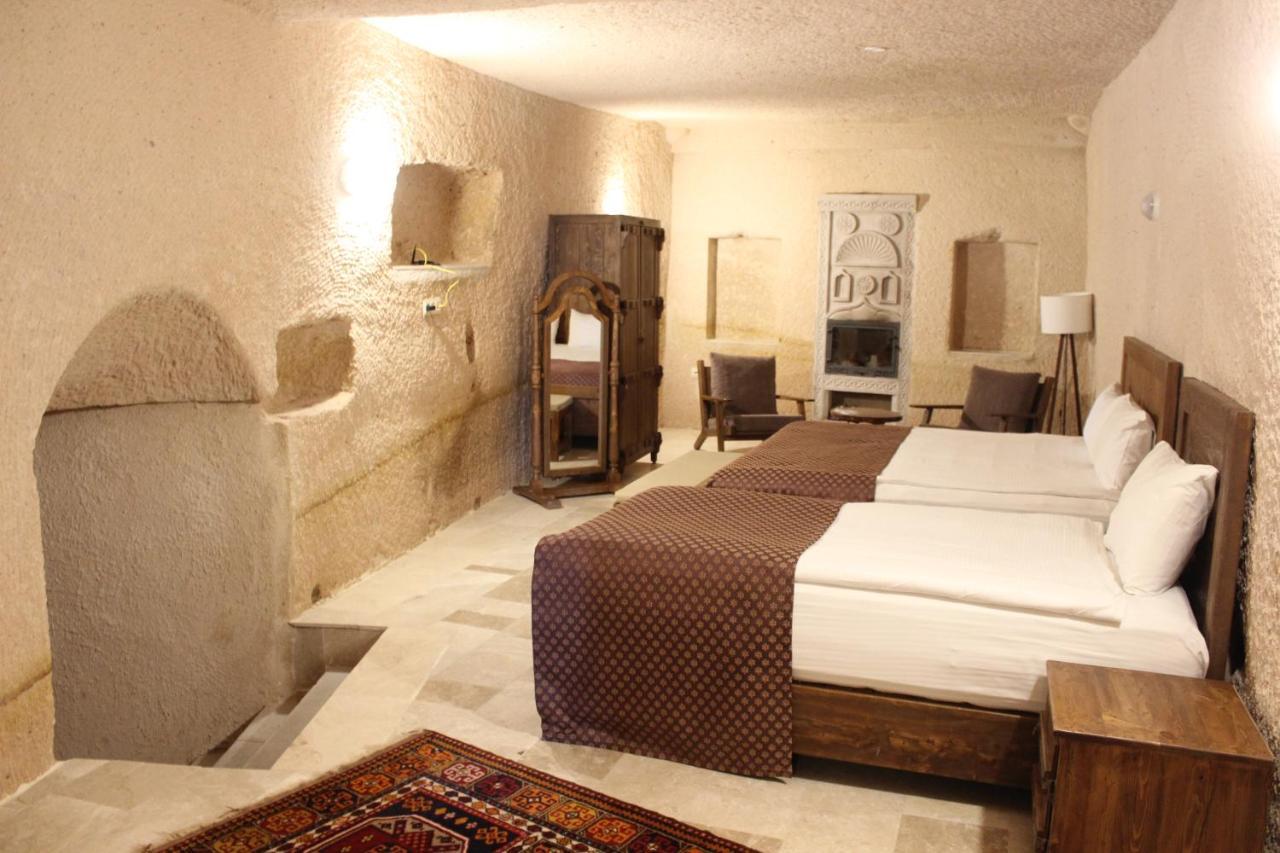 Helike Cave Suites Учисар Экстерьер фото