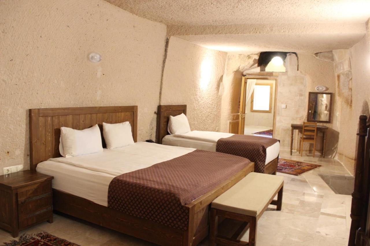 Helike Cave Suites Учисар Экстерьер фото