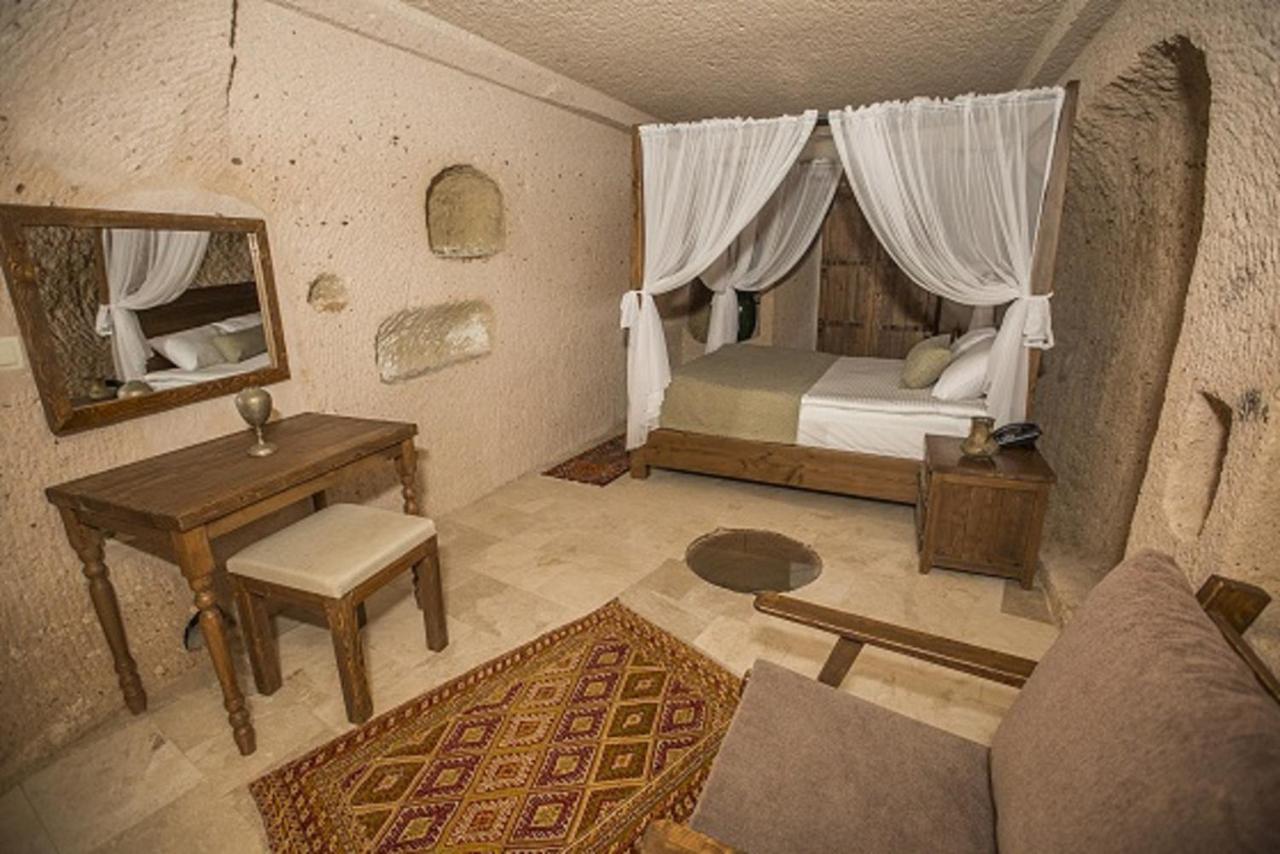 Helike Cave Suites Учисар Экстерьер фото