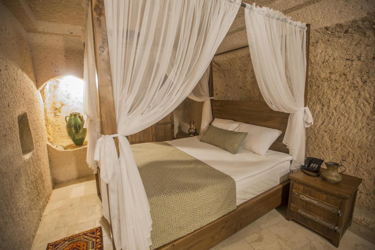Helike Cave Suites Учисар Экстерьер фото
