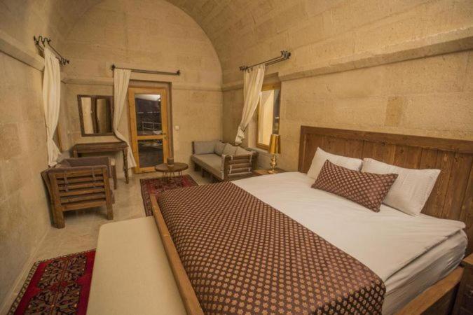 Helike Cave Suites Учисар Экстерьер фото