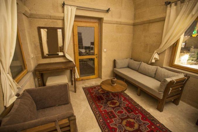 Helike Cave Suites Учисар Экстерьер фото