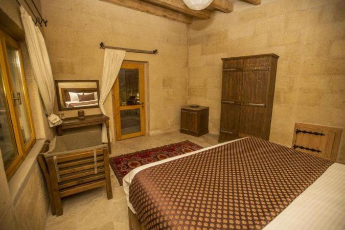 Helike Cave Suites Учисар Экстерьер фото
