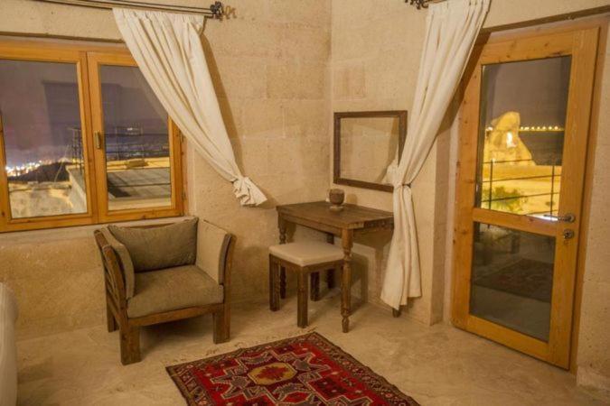 Helike Cave Suites Учисар Экстерьер фото