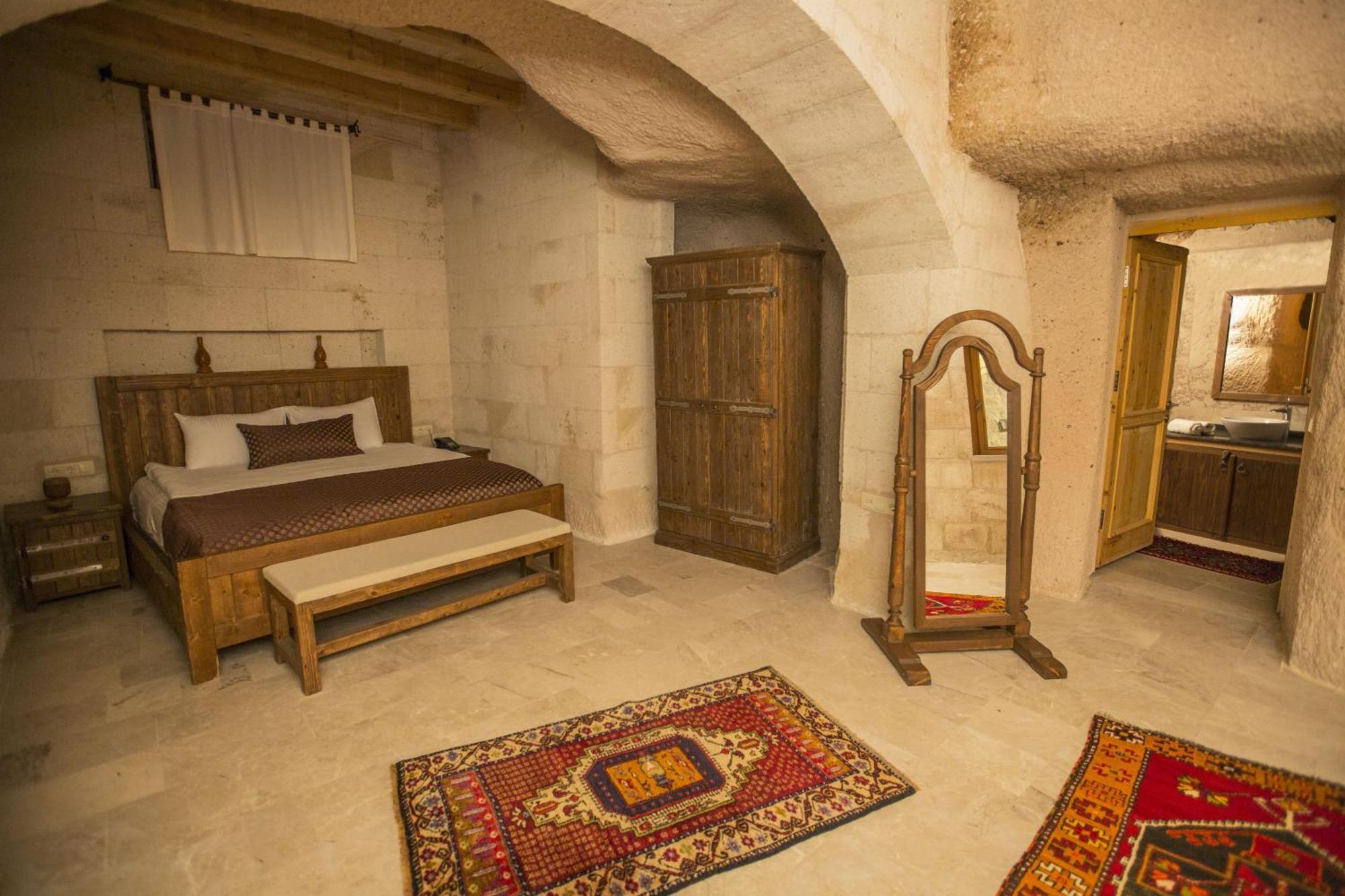 Helike Cave Suites Учисар Номер фото